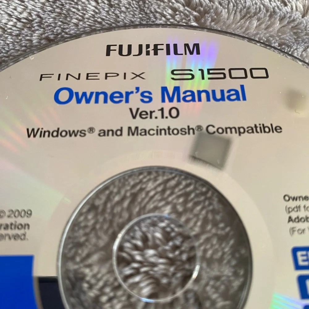Fujifilm FinePix S1500 Owner's Manual CD - Blue and Silver (944)